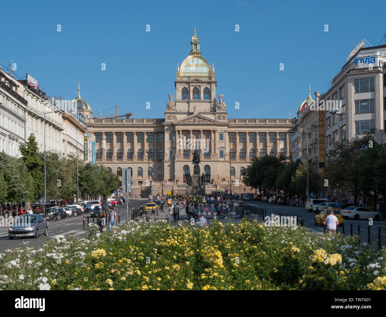 Prague, Czech Republic - June 9 2019: National Museum on Saint Wenceslas Square on a Busy Summer Day. A tourist attraction in the historic city center of Prague. Wide Angle Shot. Stock Photo