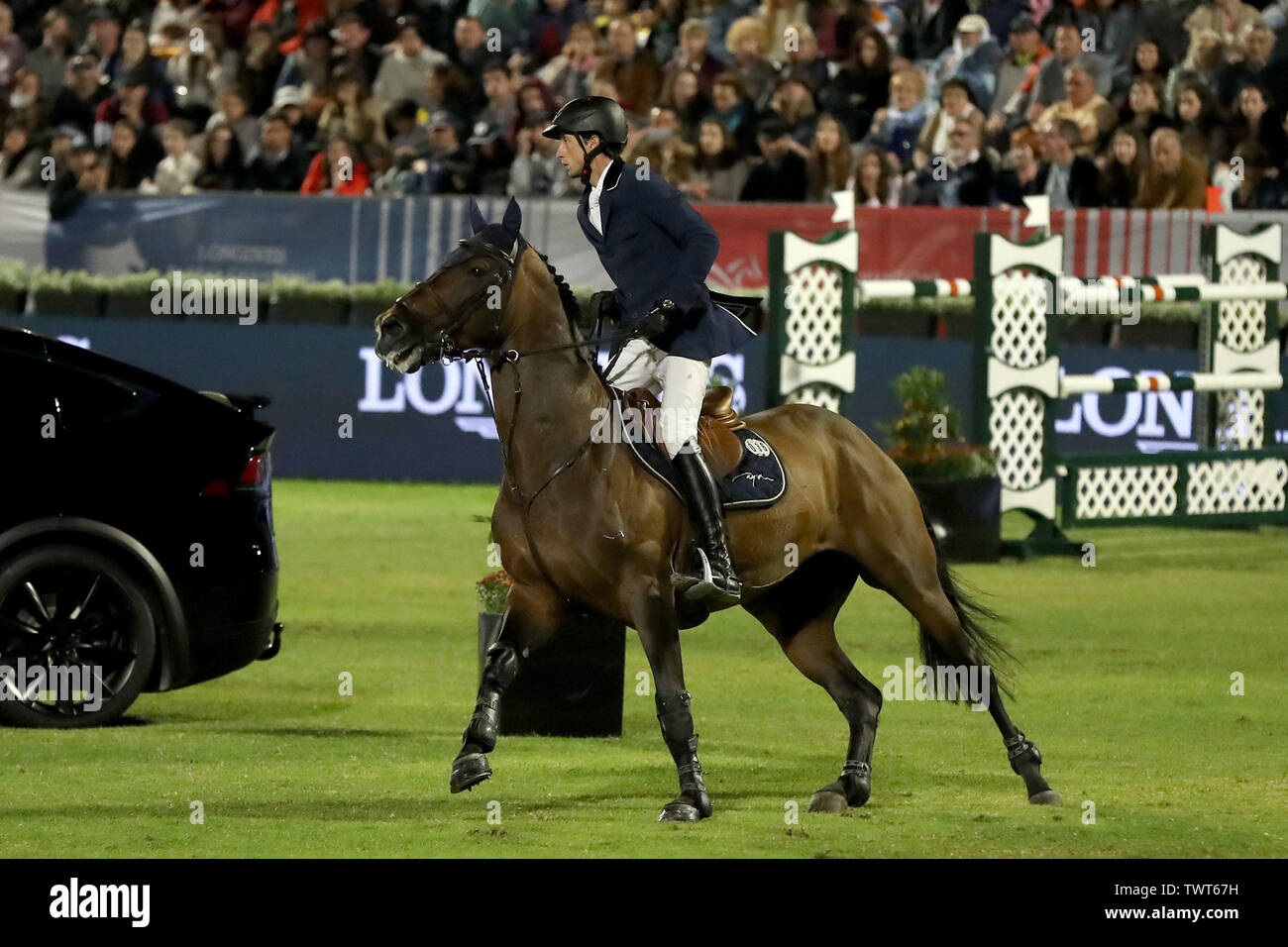 Cascais, Portugal. 22nd June, 2019. Martin Fuchs of Switzerland riding Chaplin during the Cascais Estoril jumping competition of Longines Global Champions Tour Grand Prix in Cascais, Portugal, on June 22, 2019. Credit: Petro Fiuza/Xinhua/Alamy Live News Stock Photo