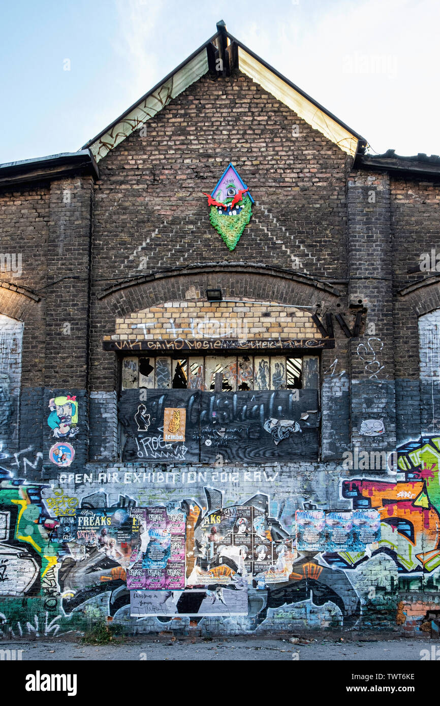 Berlin-Friedrichshain, RAW Gelände. Derelict old graffiti-covered brick wall Stock Photo