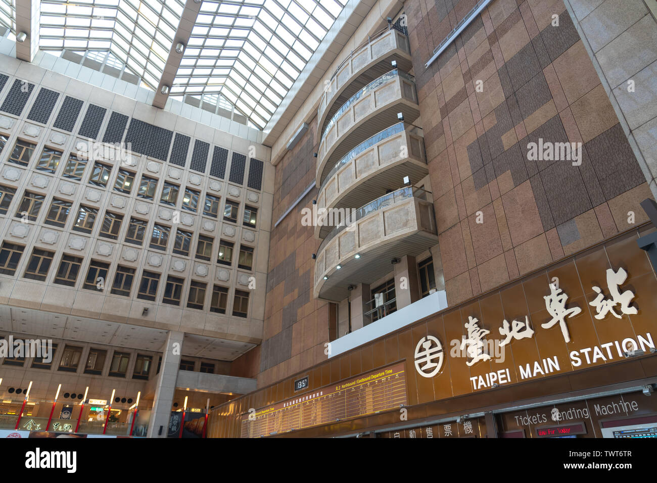 Interior of Taipei Main station building. View of lobby and shopping ...