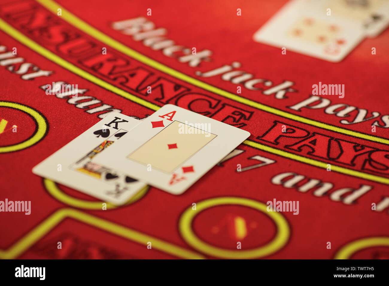 The croupier in the casino does a shuffle of cards at the table