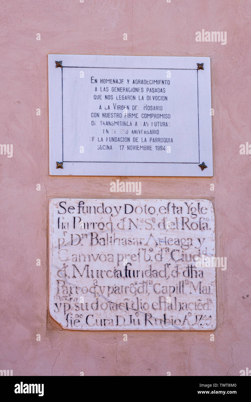 Catholic Church called ‘Nuestra Señora del Rosario' in Sucina, Murcia, Spain, Europe. Old and new plaque on church wall Stock Photo