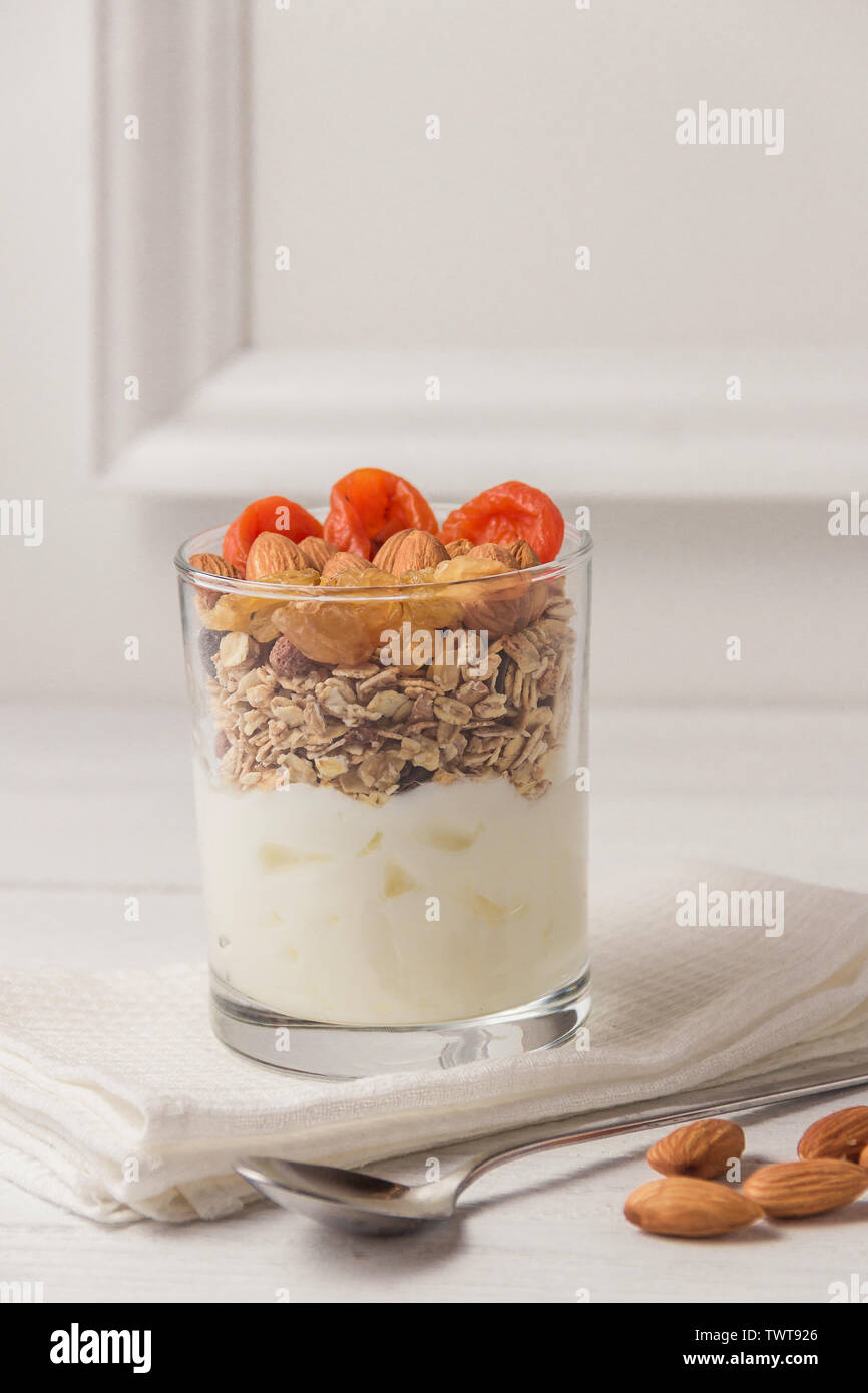 Homemade yogurt with granola, dried fruit and nuts bio with most healthy seed Stock Photo