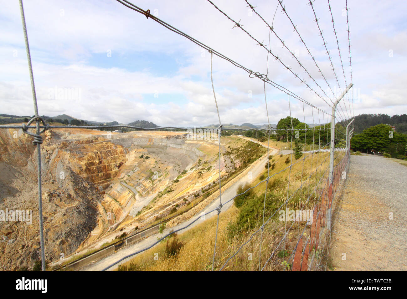 The Martha Mine is a open-cast gold mine in the New Zealand town of Waihi. A walkway is installed around the goldmine to allow visitors to explore the Stock Photo