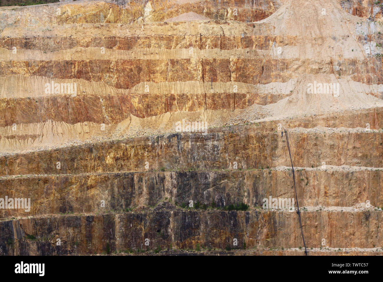 The Martha Mine is a gold mine in the New Zealand town of Waihi. The picture shows the terraces of the open-cast gold mine. Stock Photo