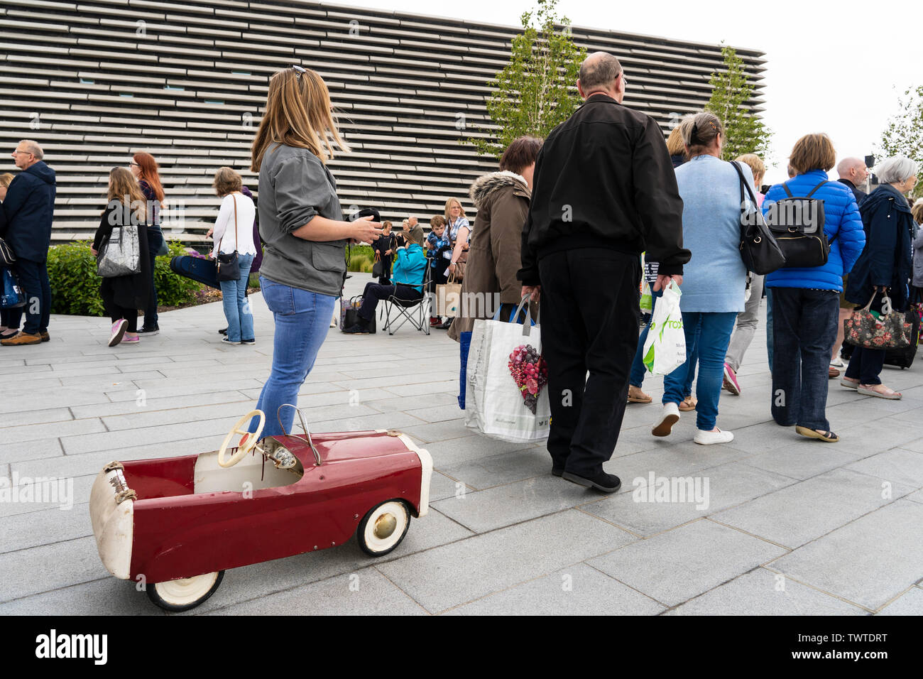 Dundee, Scotland, UK. 23 June 2019. The BBC Antiques Roadshow TV programme is aiming on location t the new V&A Museum in Dundee today. Long queues formed as members of the public arrived with their collectables to have them appraised and valued by the Antiques Roadshow experts. Select items and their owners were chosen to be filmed for the show. Credit: Iain Masterton/Alamy Live News Stock Photo