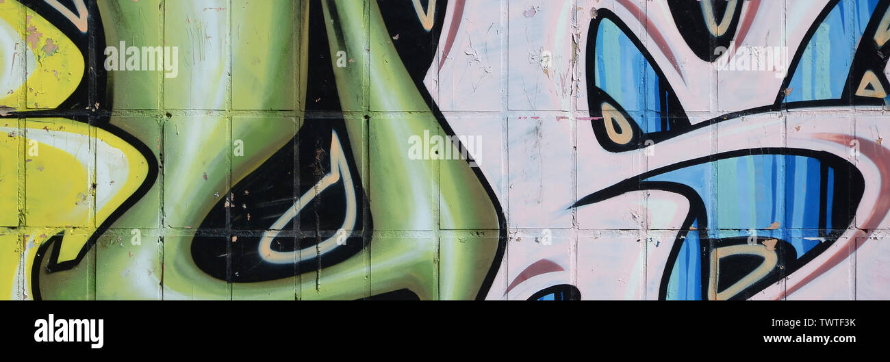 Fragment of colored street art graffiti paintings with contours and