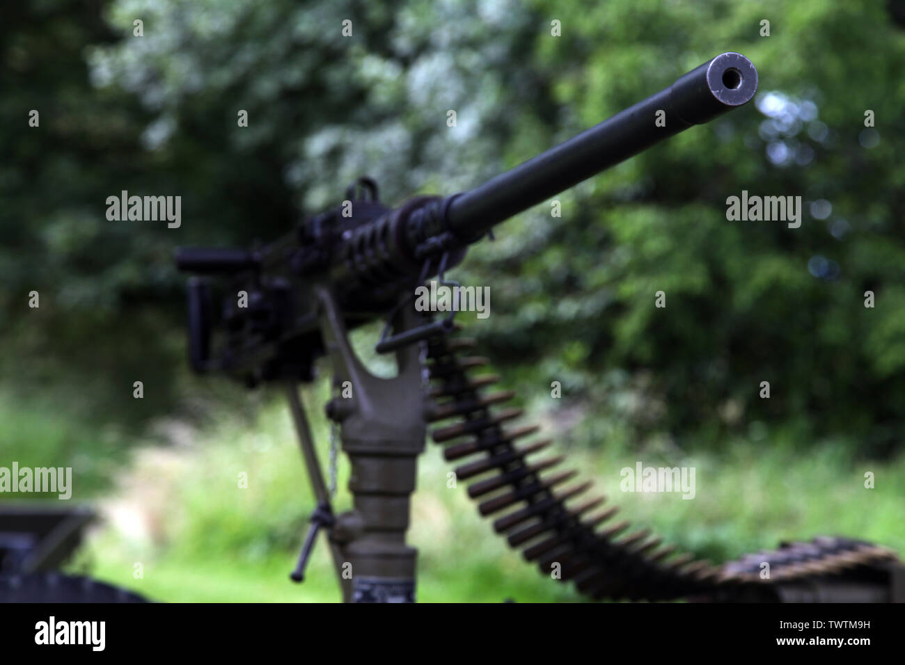 Mounted M2 Browning 50 Caliber Machine Gun With Tip In Focus And Bullets With Natural Green Background Stock Photo Alamy Mounted M2 Browning 50 Caliber Machine Gun With Tip In Focus And Bullets With Natural Green Background Stock Photo Alamy