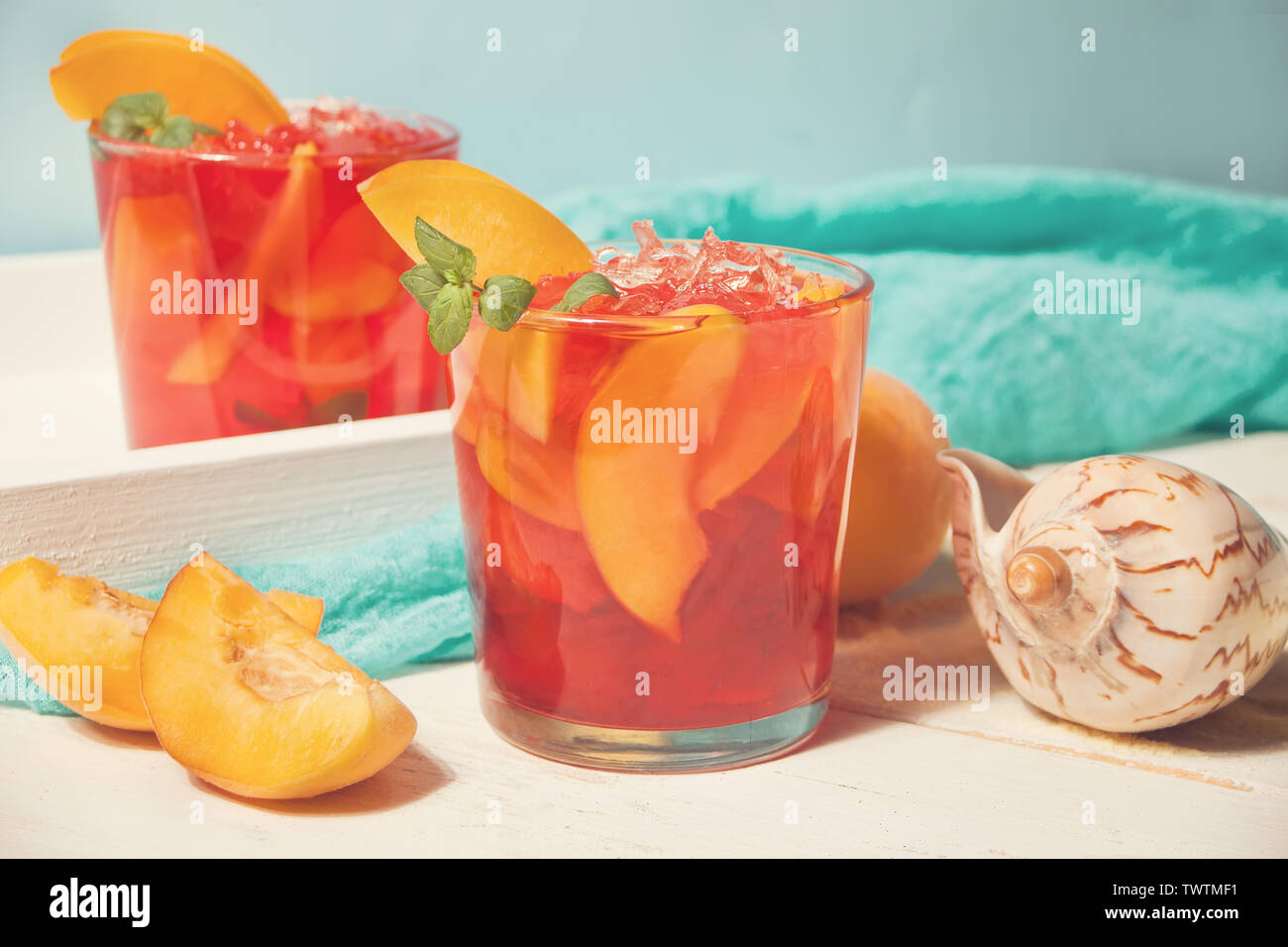 glasses-with-fresh-homemade-peach-sweet-iced-tea-or-cocktail-lemonade
