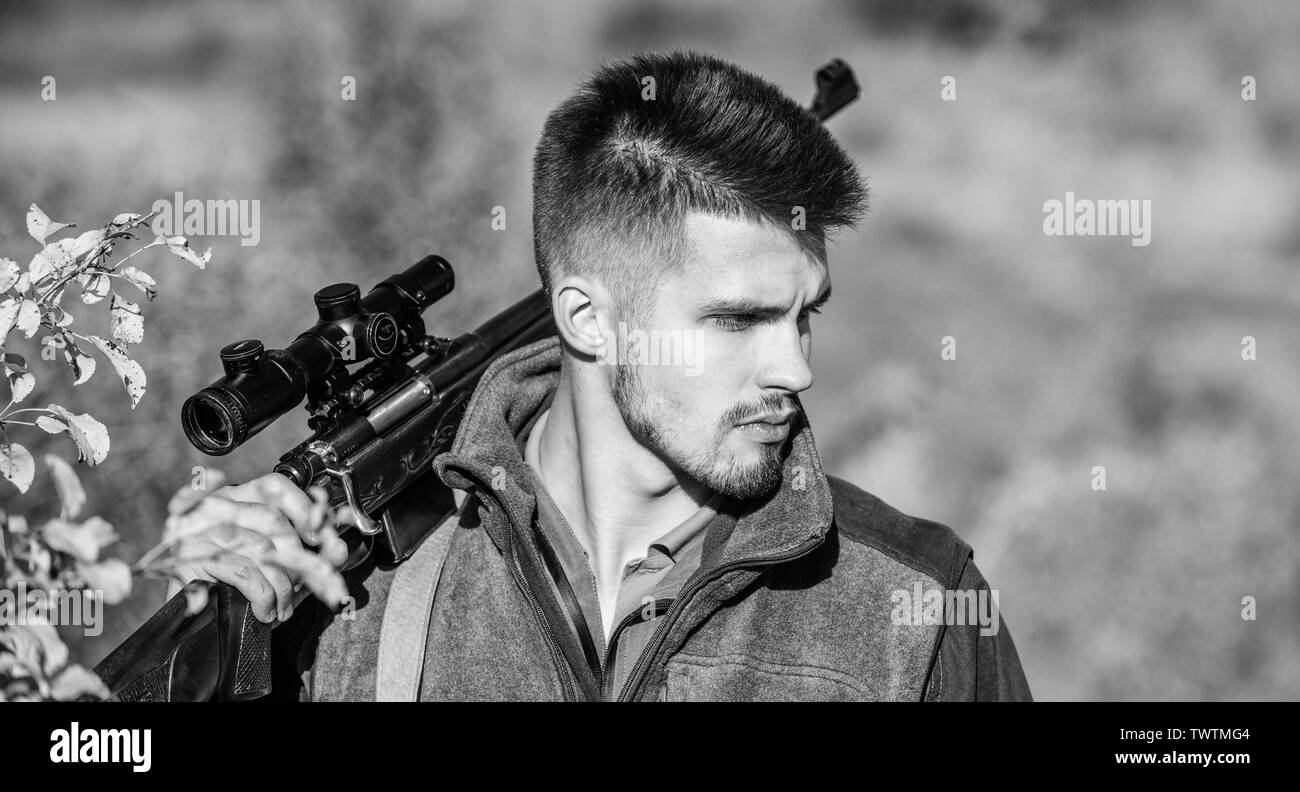 Army forces. Camouflage. Bearded man hunter. Hunting skills and weapon equipment. How turn hunting into hobby. Military uniform fashion. Man hunter with rifle gun. Boot camp. Killing workout. Stock Photo
