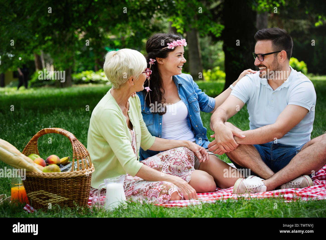 Happy family having picnic hi-res stock photography and images - Alamy