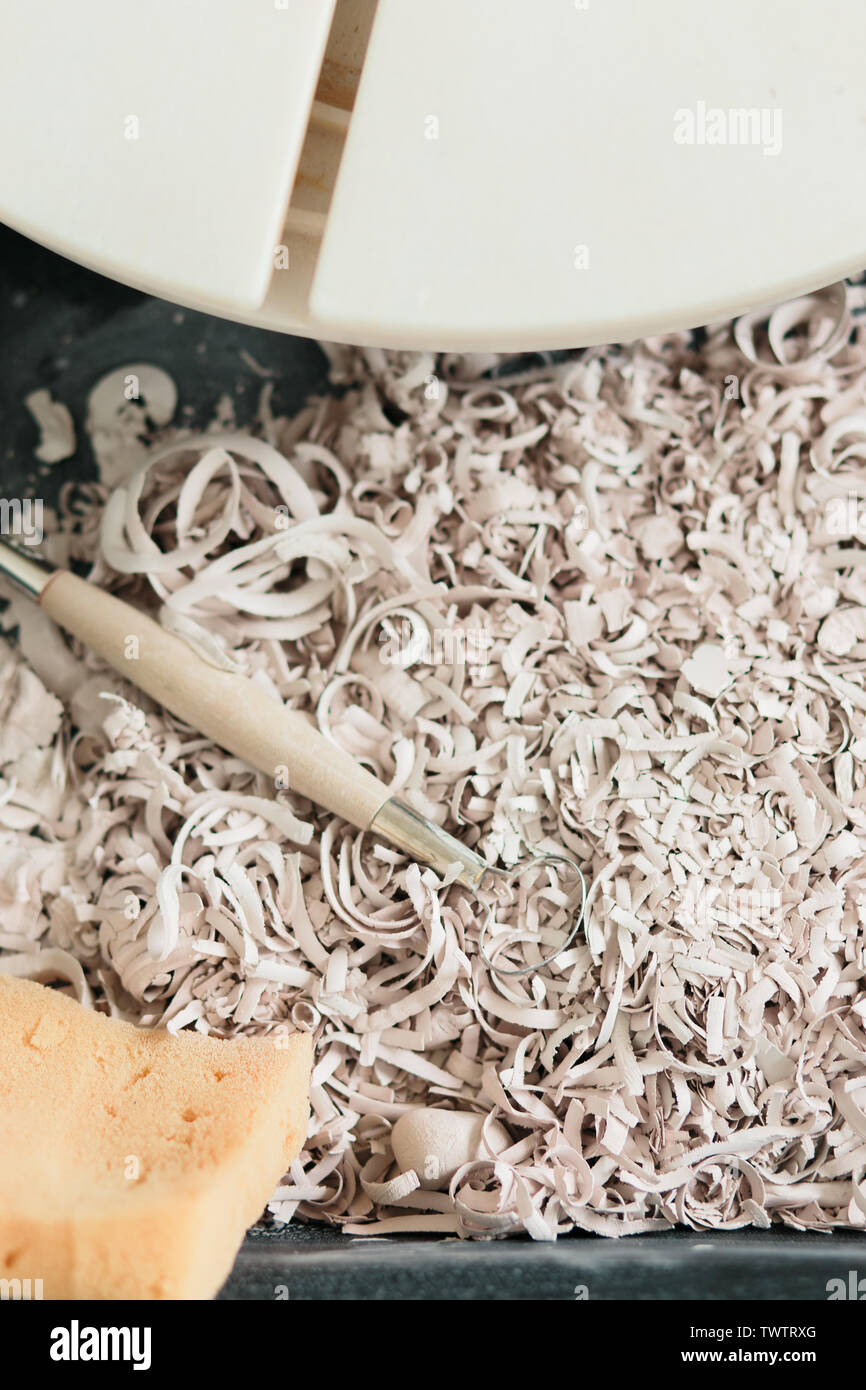 pottery tools for carving ceramic products in workshop Stock Photo