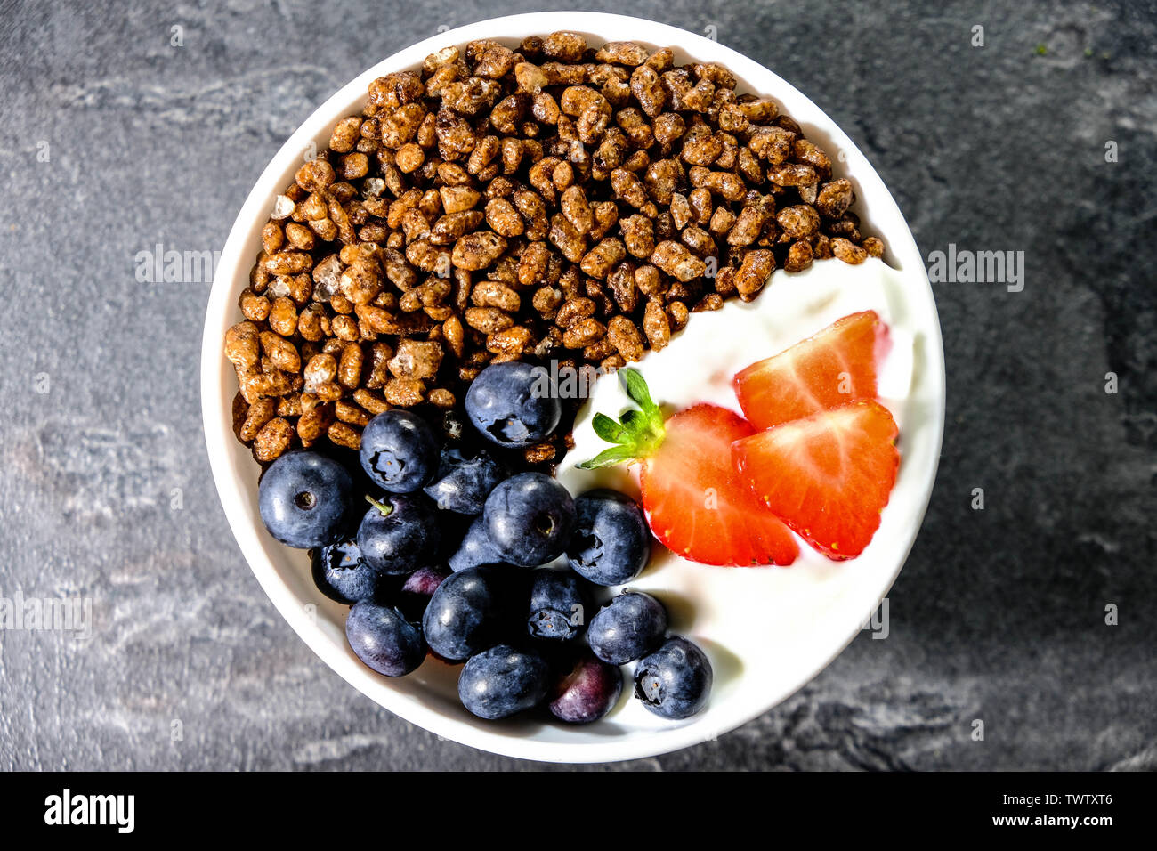Chocolate Flavoured Breakfast Cereals With Fresh Fruit Coco Pops Strawberries Blueberries And Yogurt Stock Photo Alamy