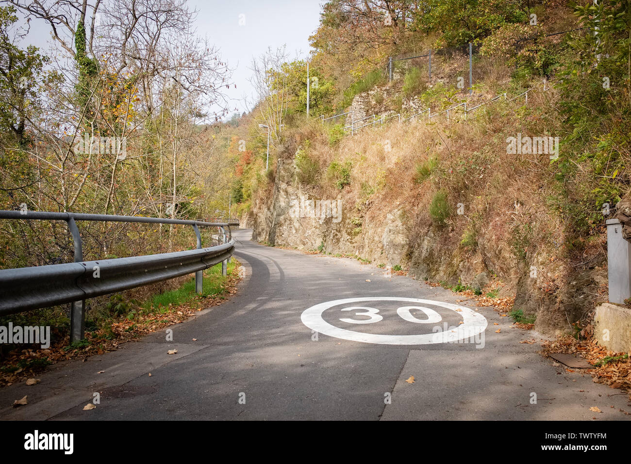 Speed limit sign marked on a country road. Clerveux, Luxembourg Stock Photo