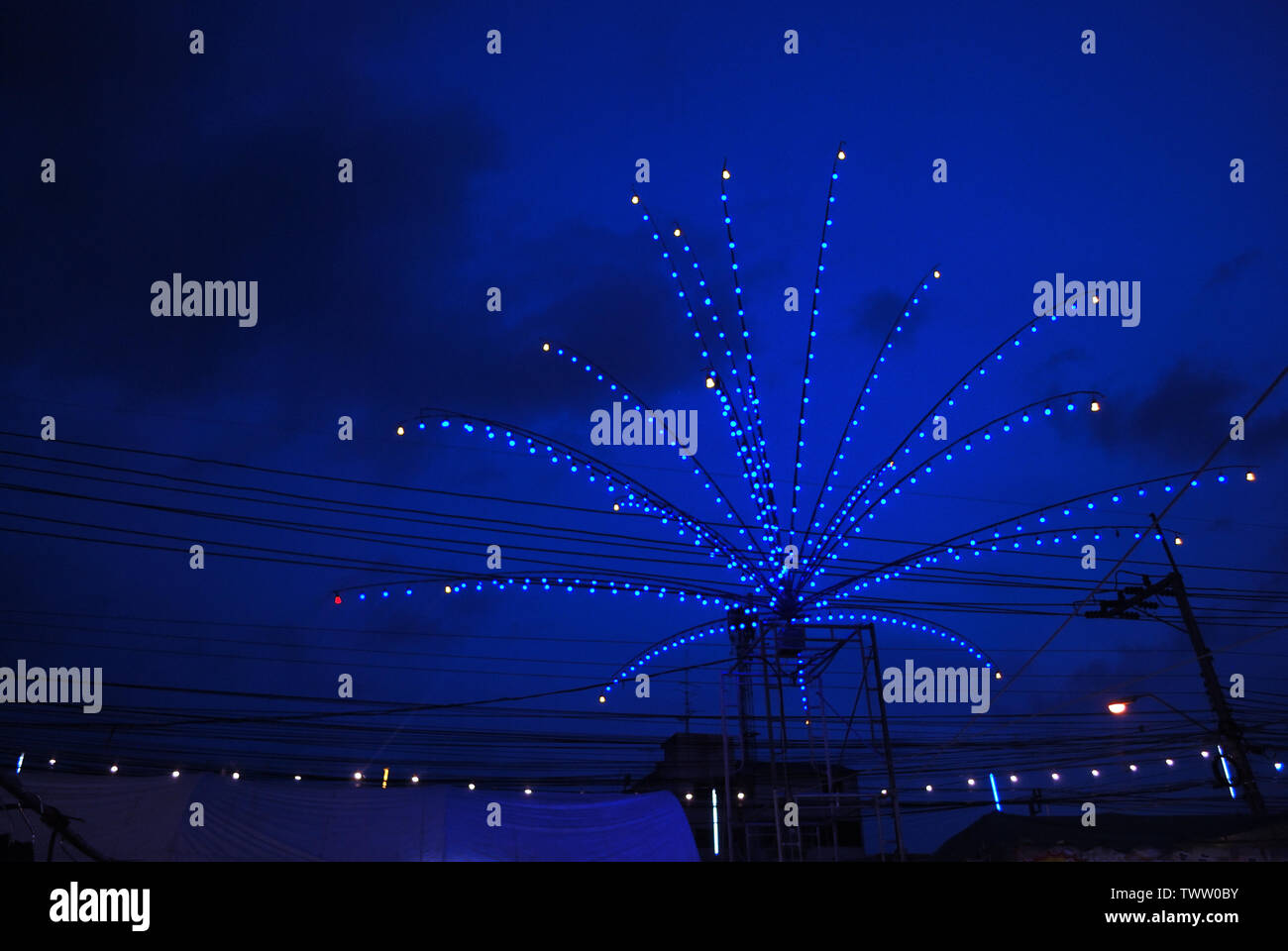 The lights are decorated with neon lights at night with a variety of