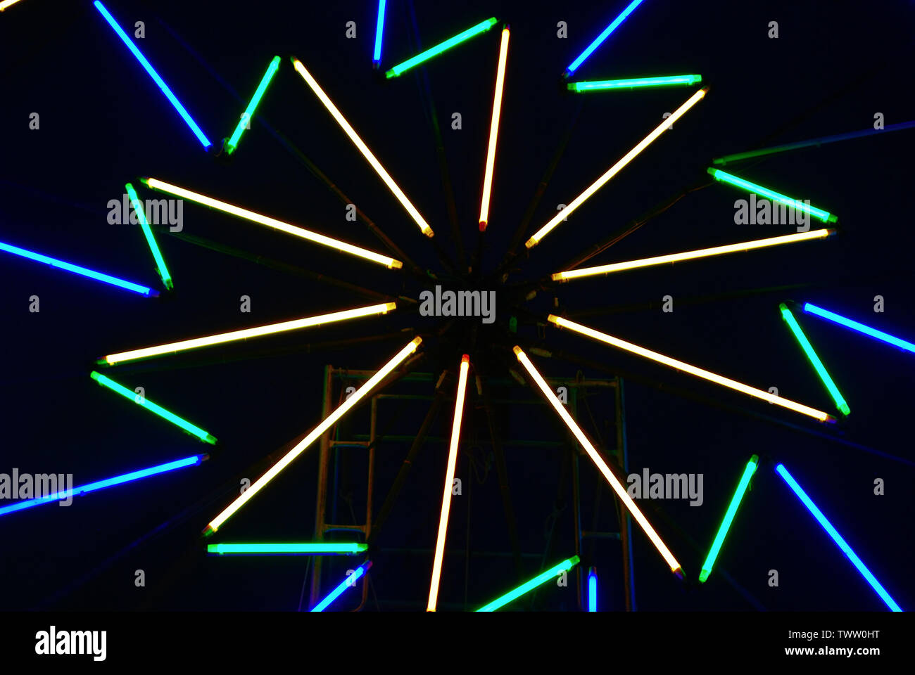The lights are decorated with neon lights at night with a variety of