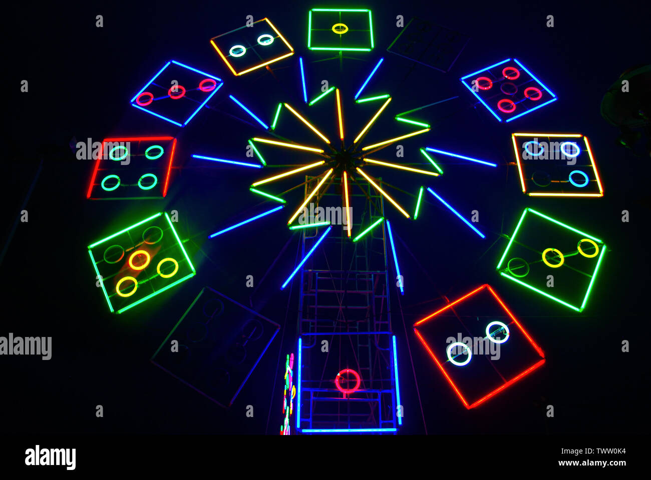 The lights are decorated with neon lights at night with a variety of