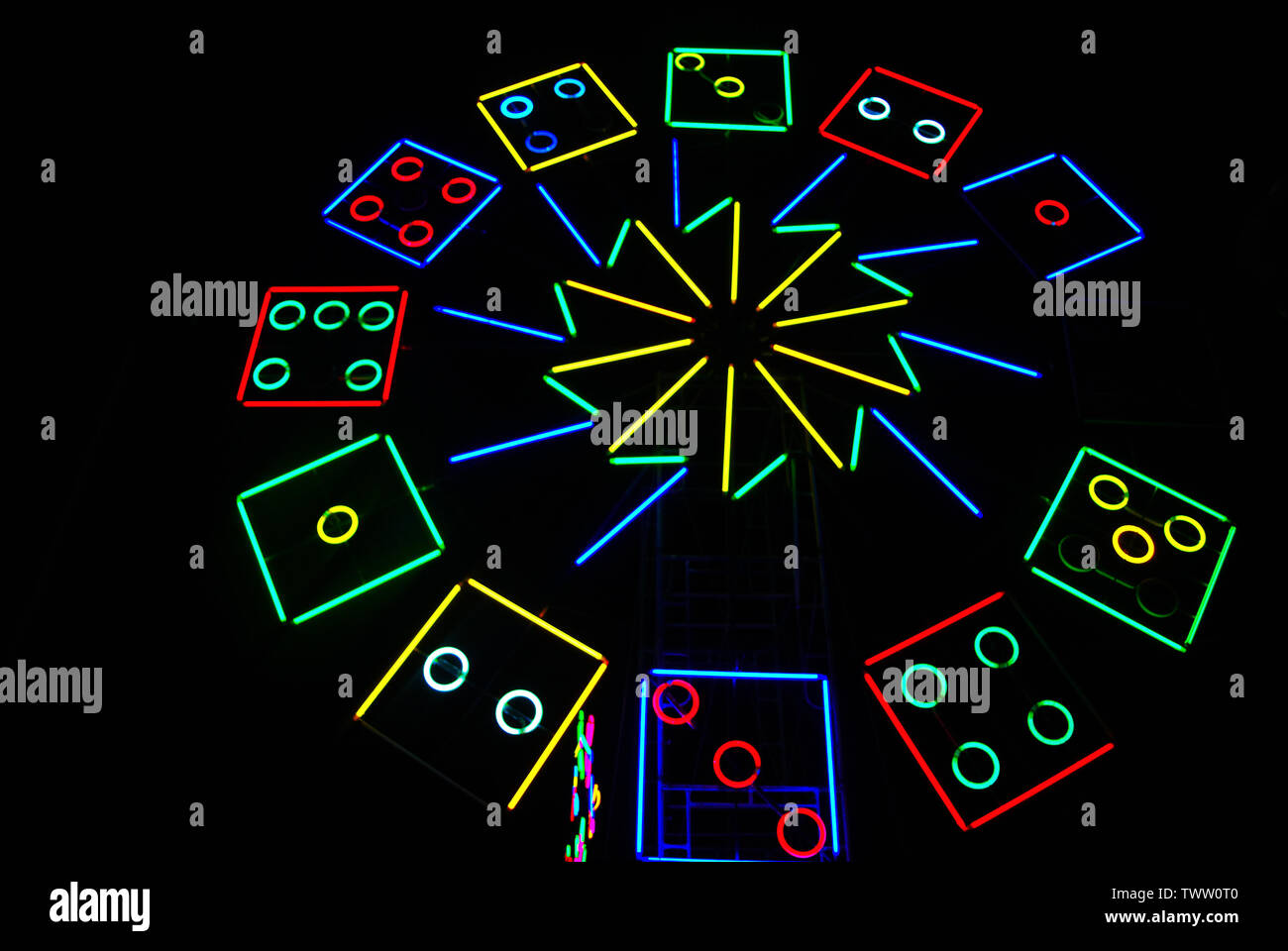 The lights are decorated with neon lights at night with a variety of