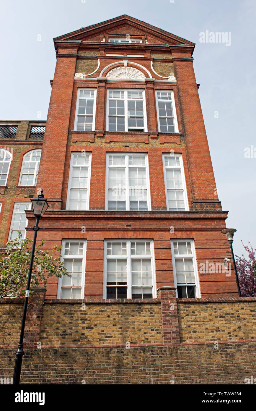Flats or appartments in Wollaton House an old Victorian Board school conversion in Richie Street, London Borough of Islington, England, Britain UK Stock Photo