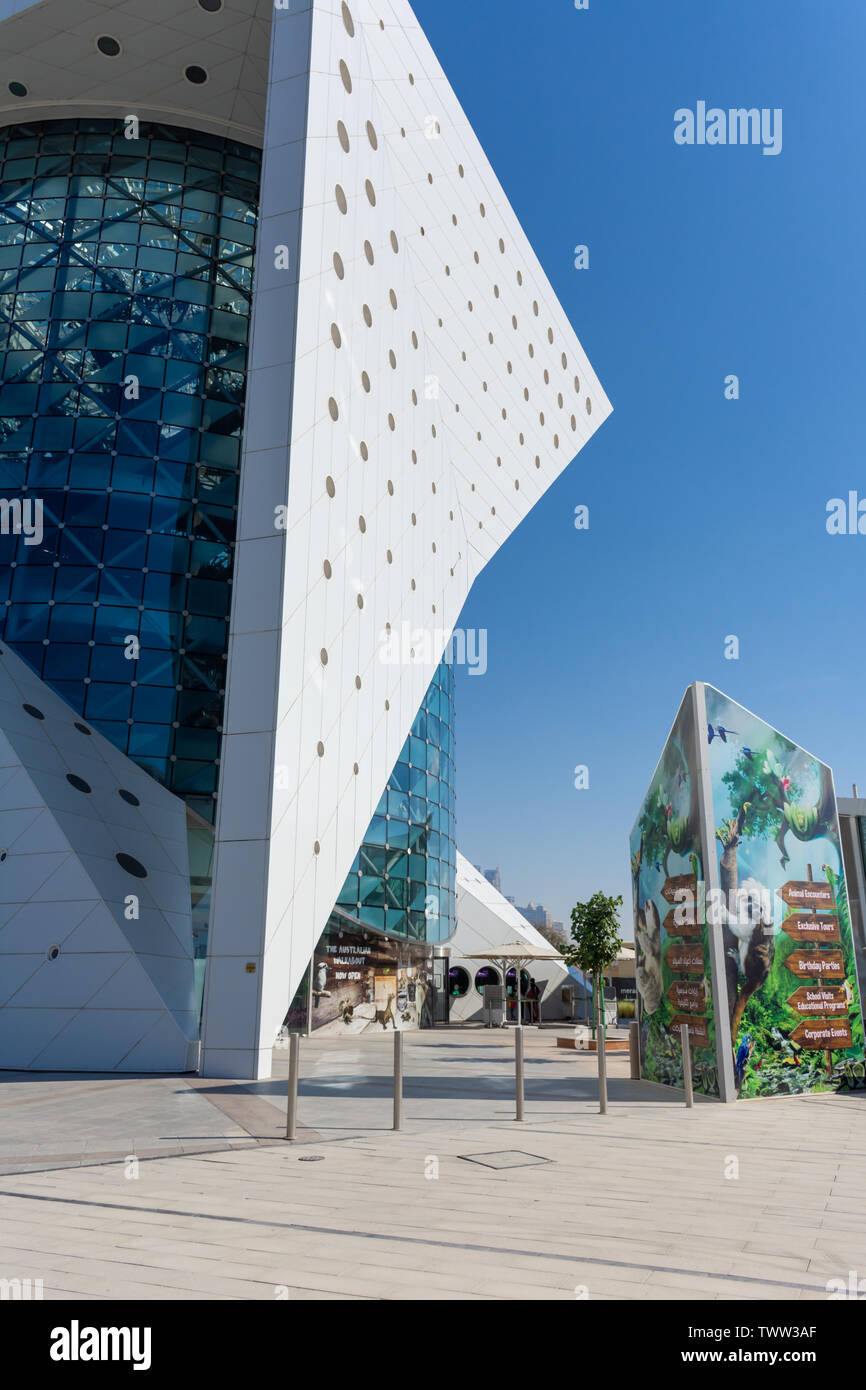 'Dubai, Dubai/United Arab Emirates - 6/2/2019: Green Planet in Dubai is the World's largest indoor rainforest. Exterior against blue sky entrance way. Stock Photo