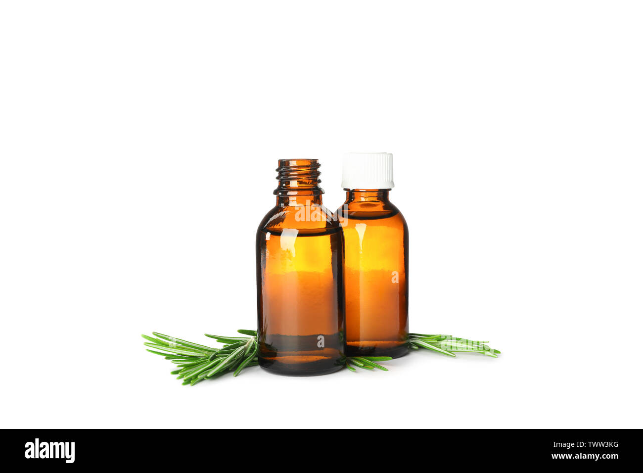 Rosemary oil in jars isolated on white background Stock Photo Alamy