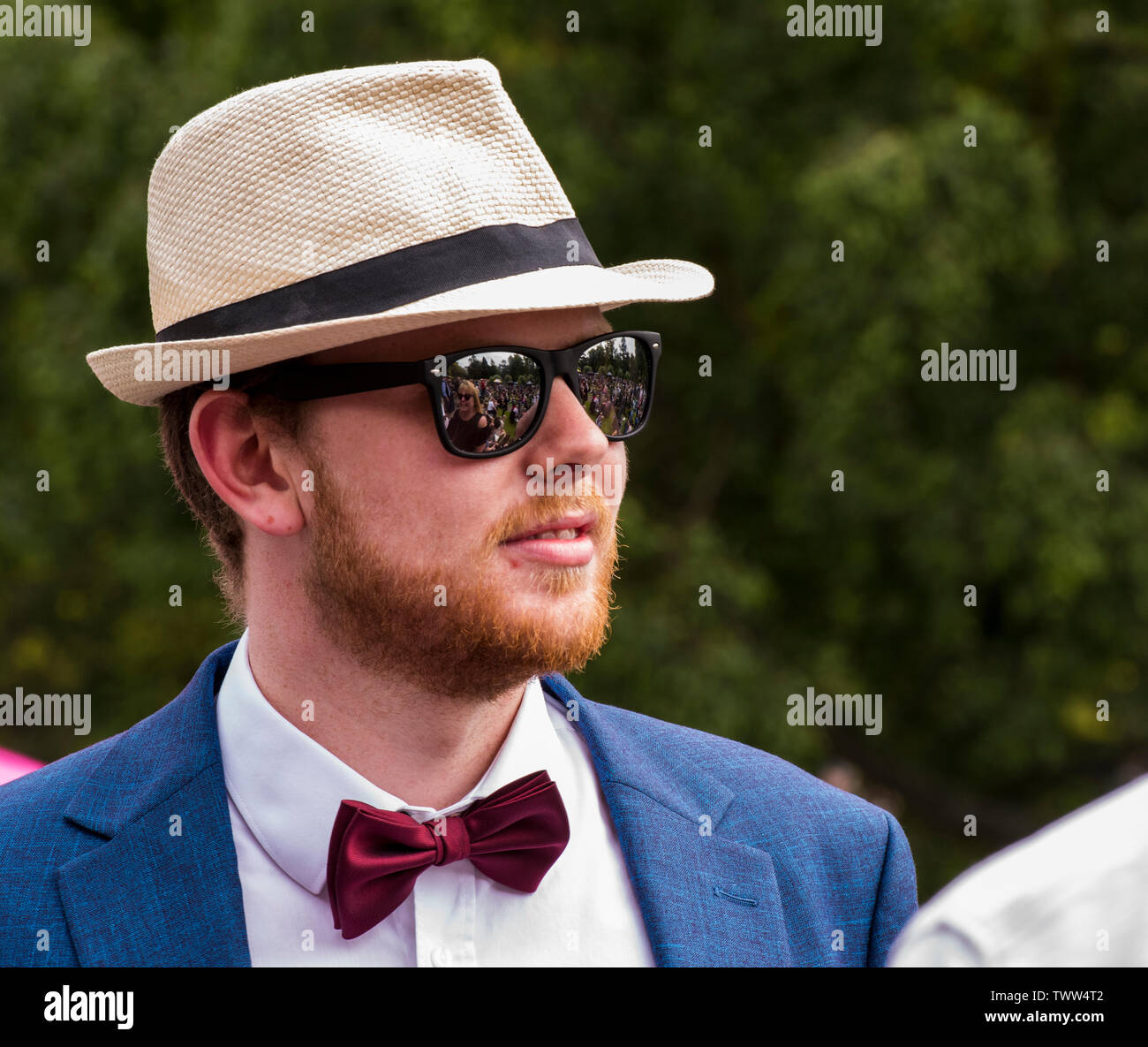 Man wearing trilby hat and sunglasses in Valley Gardens on 1940s Day, Harrogate, England, UK, 23rd June 2019. Stock Photo