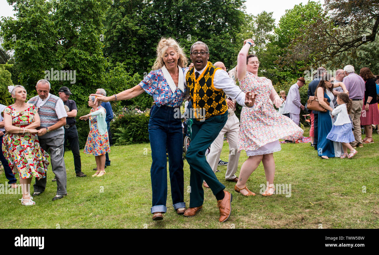 Energetic couple dancing and having fun on 1940s Day, Harrogate, England, UK, 23rd June 2019. Stock Photo