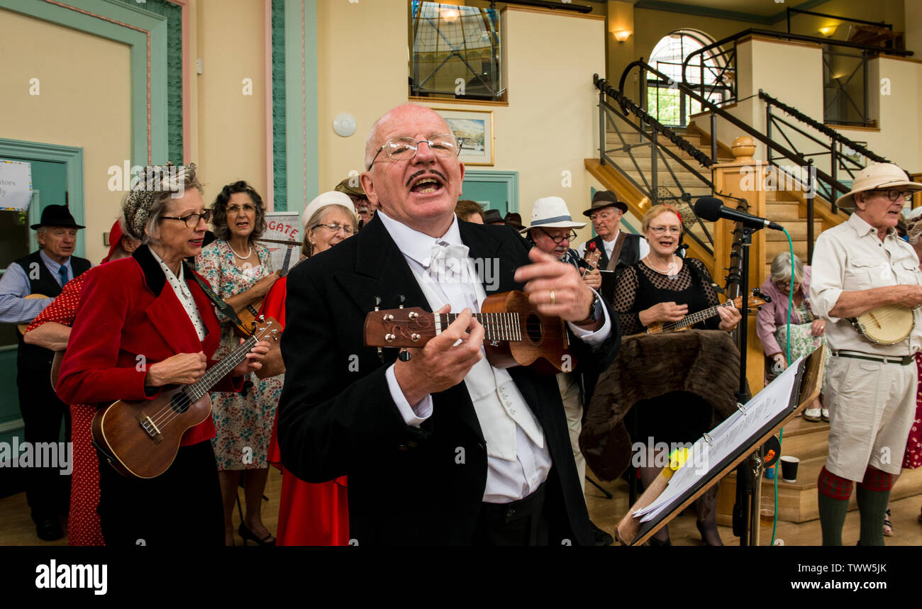 Ukulele band playing in the Sun Pavilion on 1940s Day, Harrogate, England, UK, 23rd June 2019. Stock Photo