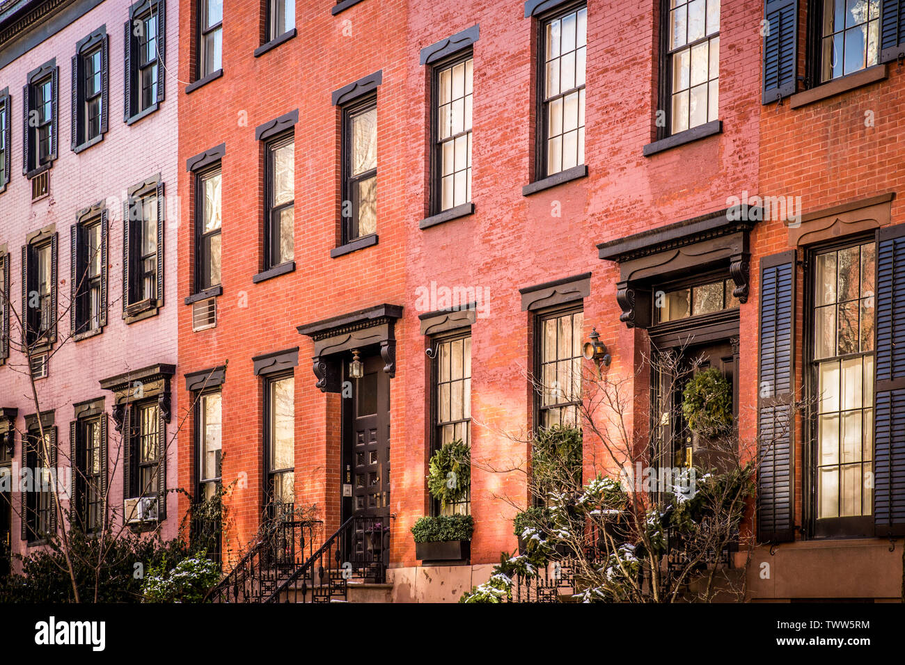 Row of lovely brick and brownstone New York City apartments seen from