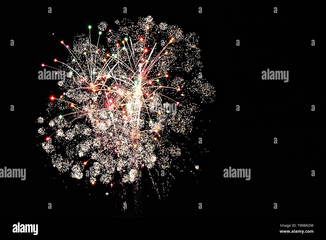 Firework celebrations in the night sky Stock Photo - Alamy