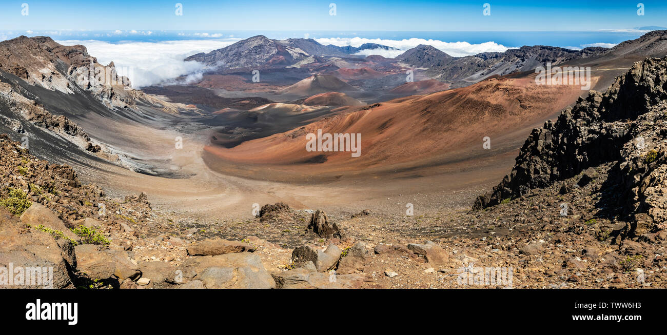 Gorgeous view of the Haleakala Crater in Haleakala National Park, showing various forms of geology and the clouds rolling in. Maui, Hawaii, USA Stock Photo