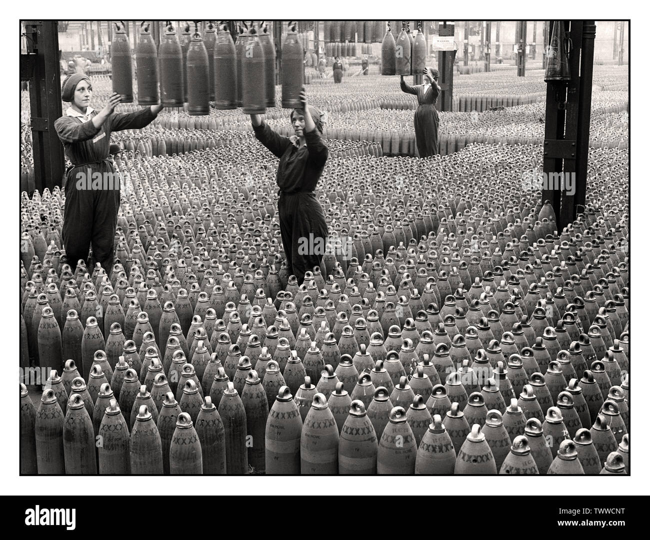 Vintage 1915 World War 1 Factory Shell Munitions Female women war work Production Information Propaganda image of the extensive Chilwell munitions filling factory, Britain WW1 More than 19 million infantry and naval shells were filled with explosives here by 10,000 workers between 1915-1918, during World War 1. The factory filled 50% of all British shells during the Great First World War. Stock Photo