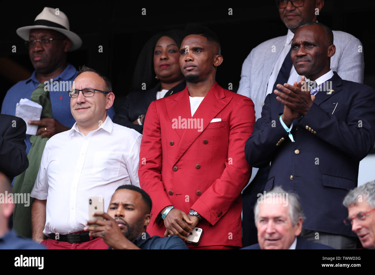 Valenciennes, France. 23rd June, 2019. Former football player Samuel Eto'o (C) of Cameroon looks on during the round of 16 match between England and Cameroon at the 2019 FIFA Women's World Cup in Valenciennes, France, on June 23, 2019. Credit: Zheng Huansong/Xinhua/Alamy Live News Stock Photo