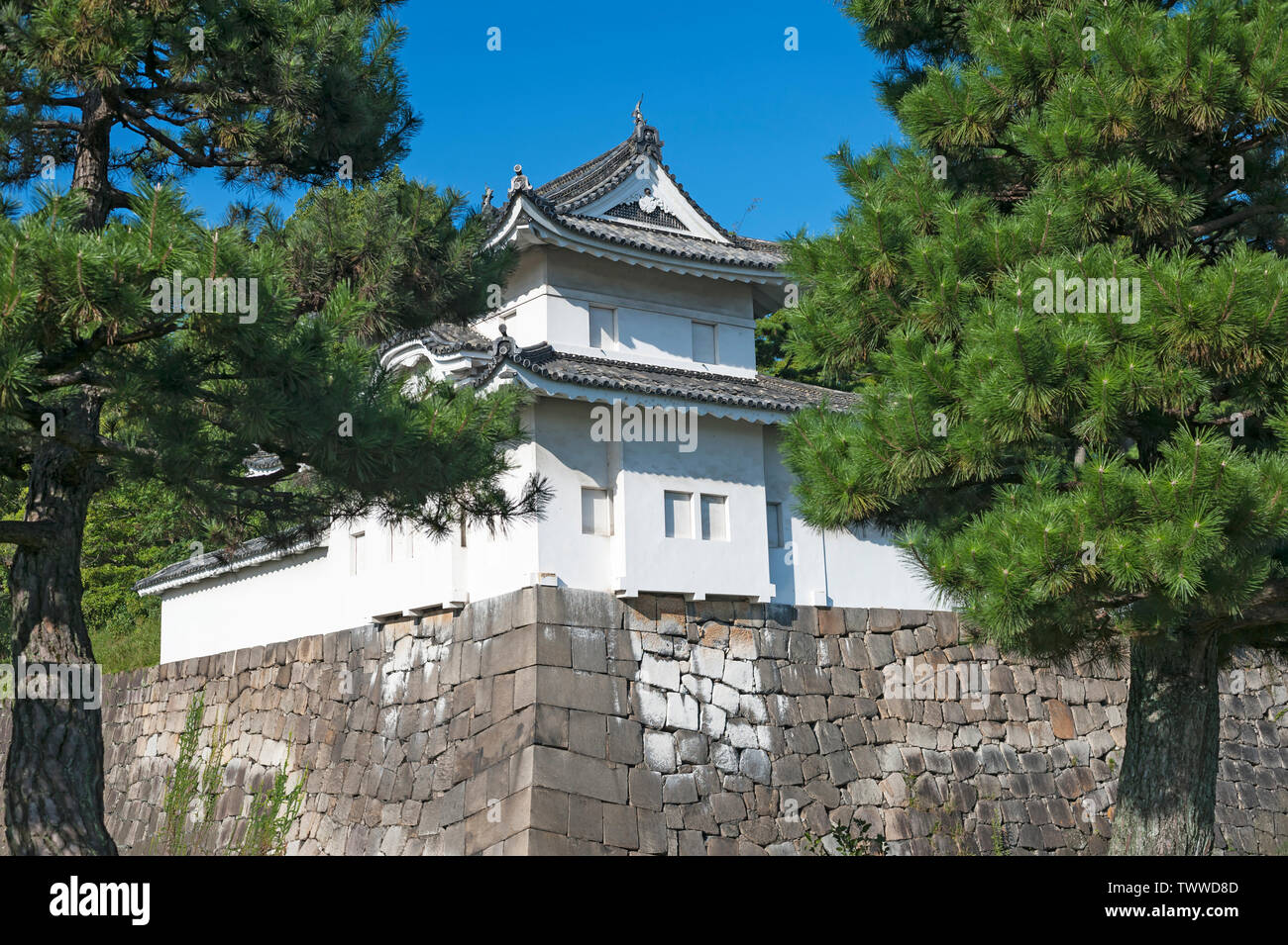 Fortified control wing, look-out building standing on stone wall of moat defending the Nijo Castle grounds, Kyoto, Japan. Stock Photo