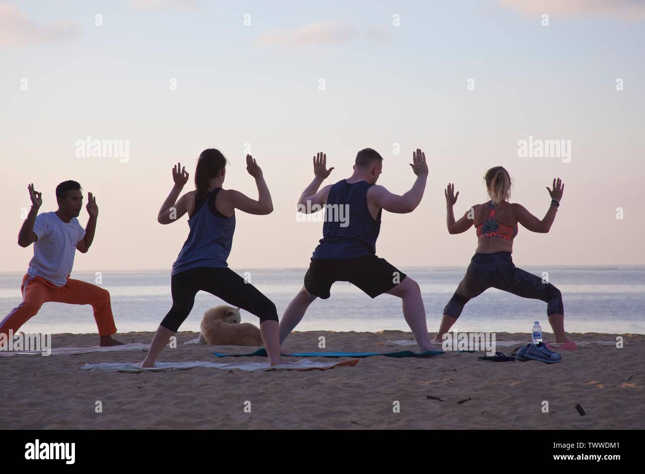 Beach yoga Stock Photo