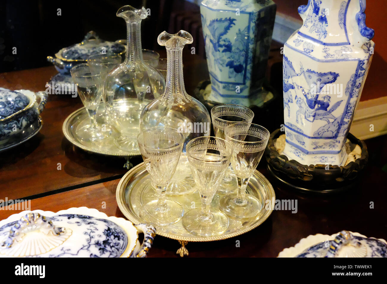 Sherry decanter and glasses on a Victorian sideboard John Gollop