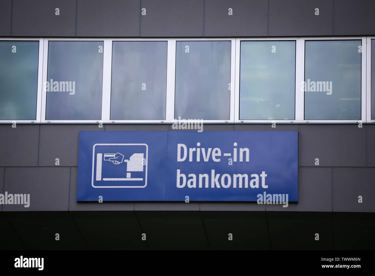 Drive in bankomat (atm ) logo on the business building. Stock Photo