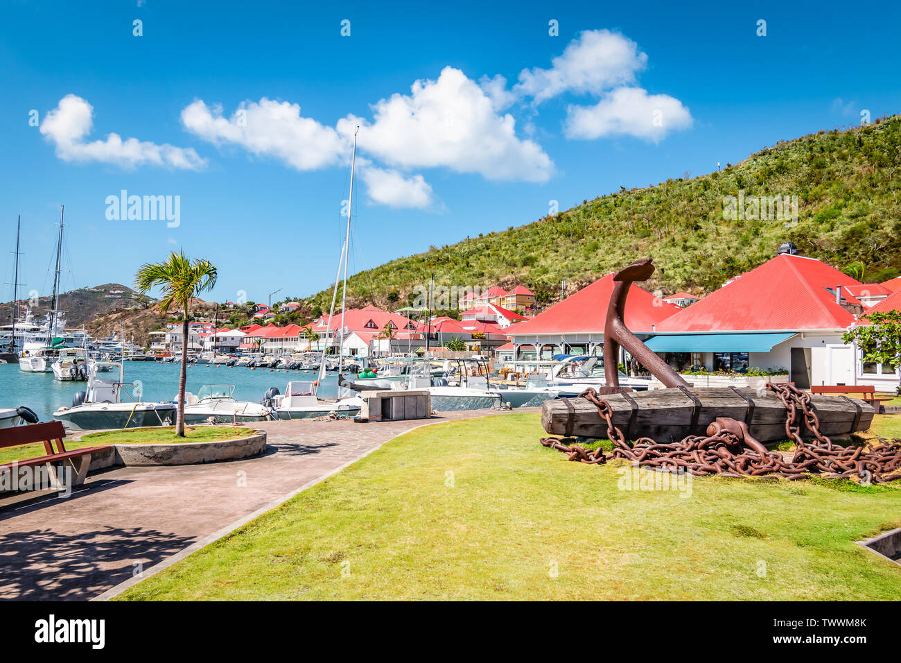 Gustavia, harbor landscape with red rooftop buildings. Saint Barthelemy, St Barts, St Barths. Stock Photo
