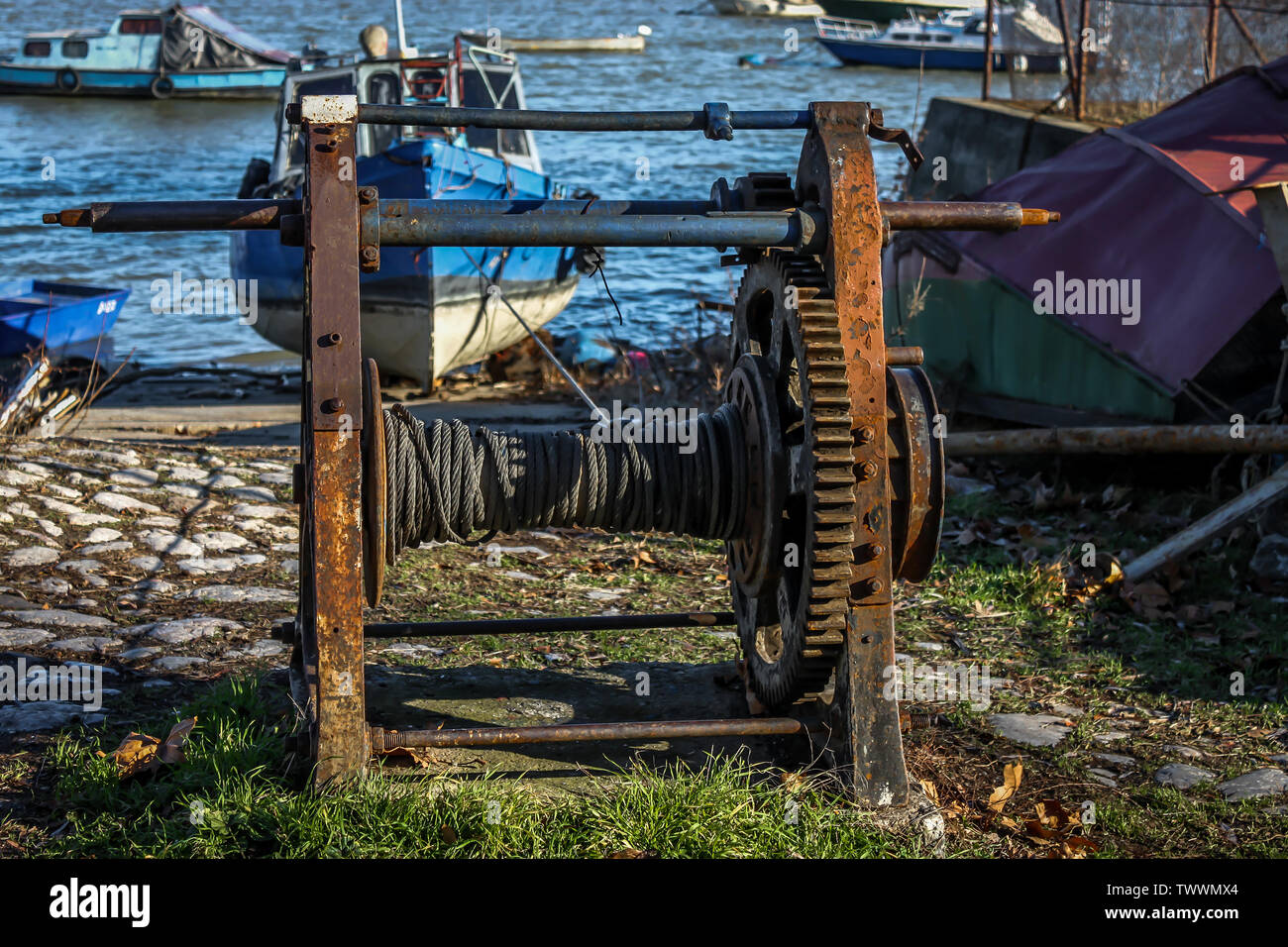 Old pulley for pulling a boat out of the water Stock Photo