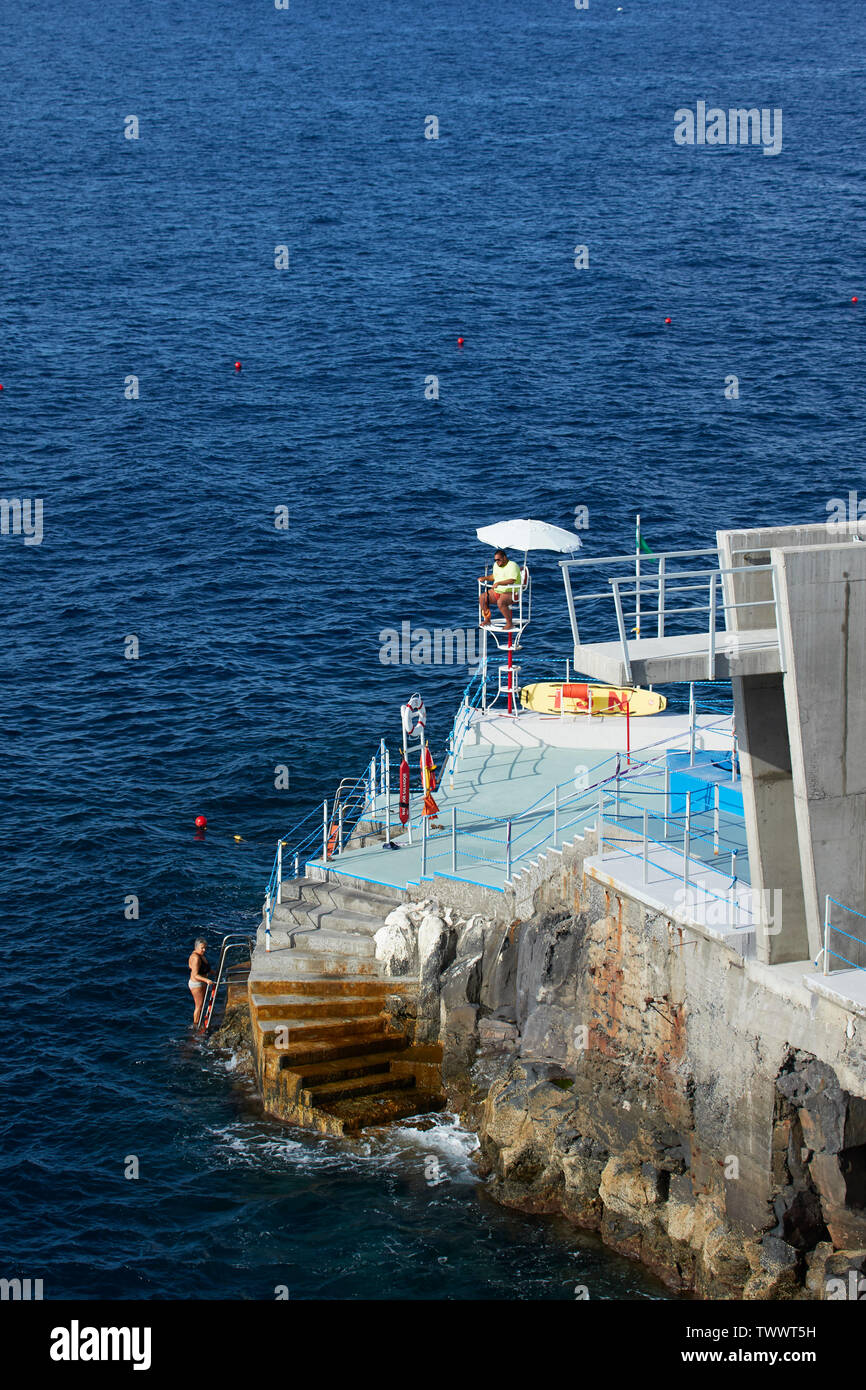 Lifeguard at Lido along the coastal walk of Frente Mar, Funchal, Madeira, Portugal, European Union Stock Photo