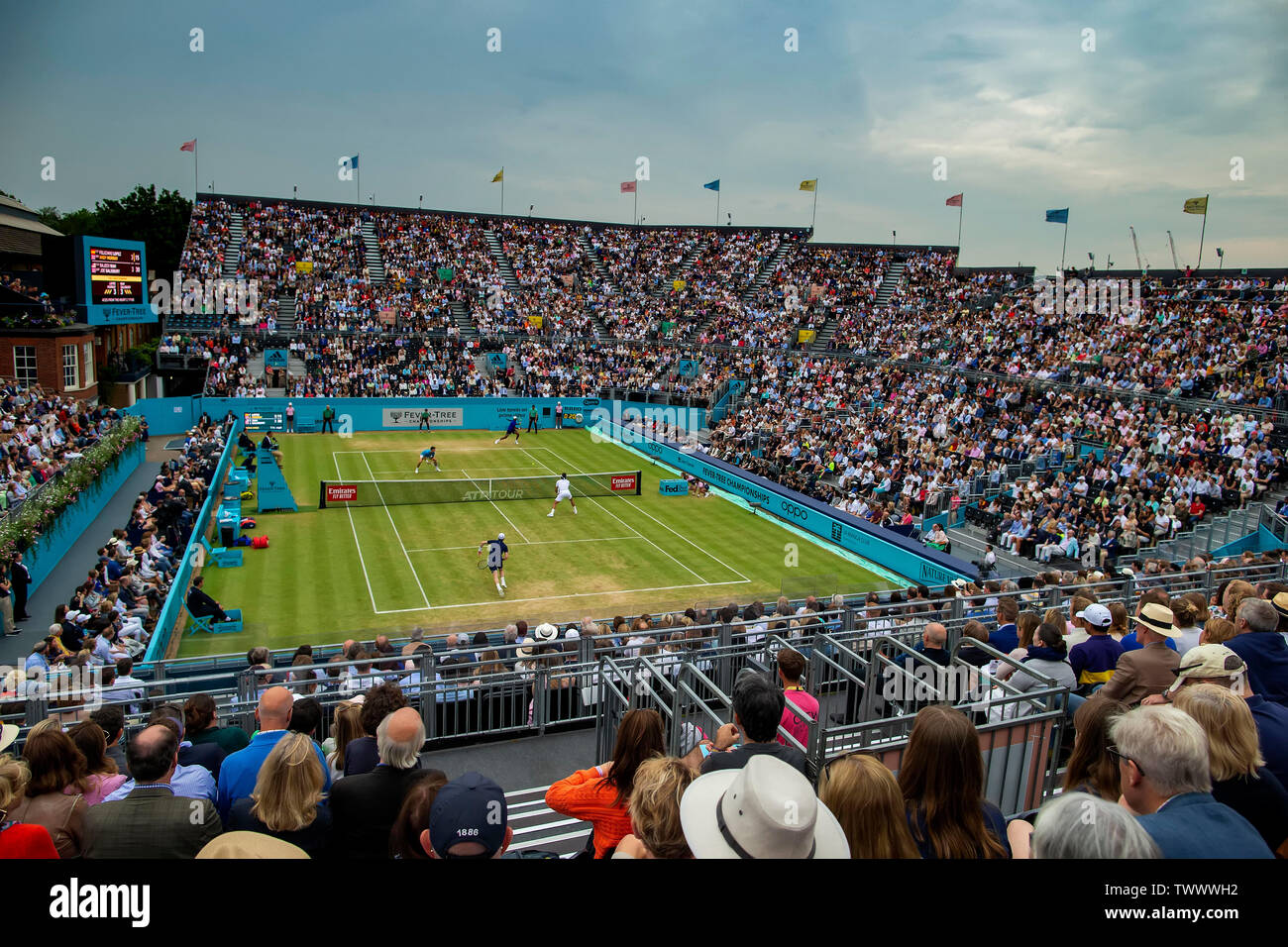 Queens Club, London, UK. 23rd June, 2019. The ATP Fever-Tree Tennis  Tournament; A full crowd at Queens club watching Andy Murray (GBR) and  Feliciano Lopez (ESP) against Rajeev Ram (USA) and Joe