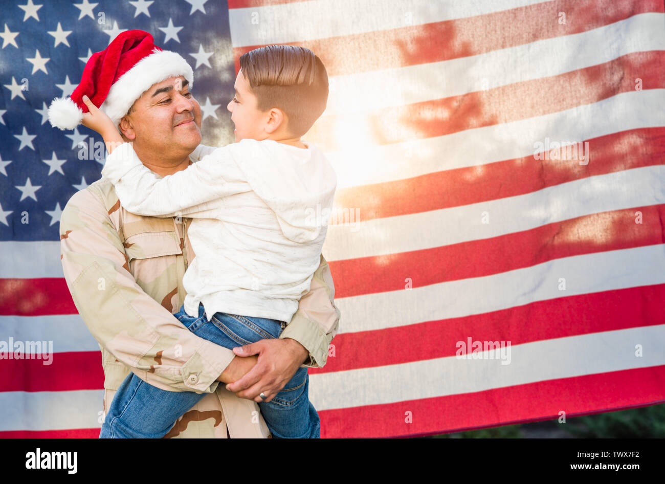family; son; father; dad; daddy; home; house; returning; hispanic; Mexican; Armed Forces; soldier; Christmas; holiday; holidays; Latino; mixed race; d Stock Photo