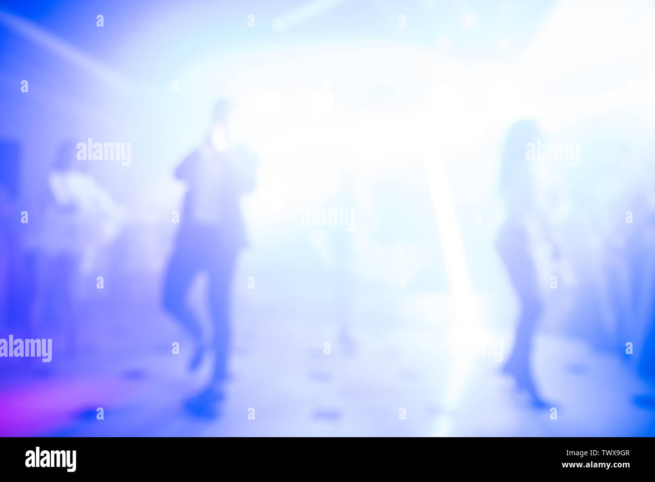 Abstract colorful background for design. Dance party in nightclub, light spotlights. Stock Photo