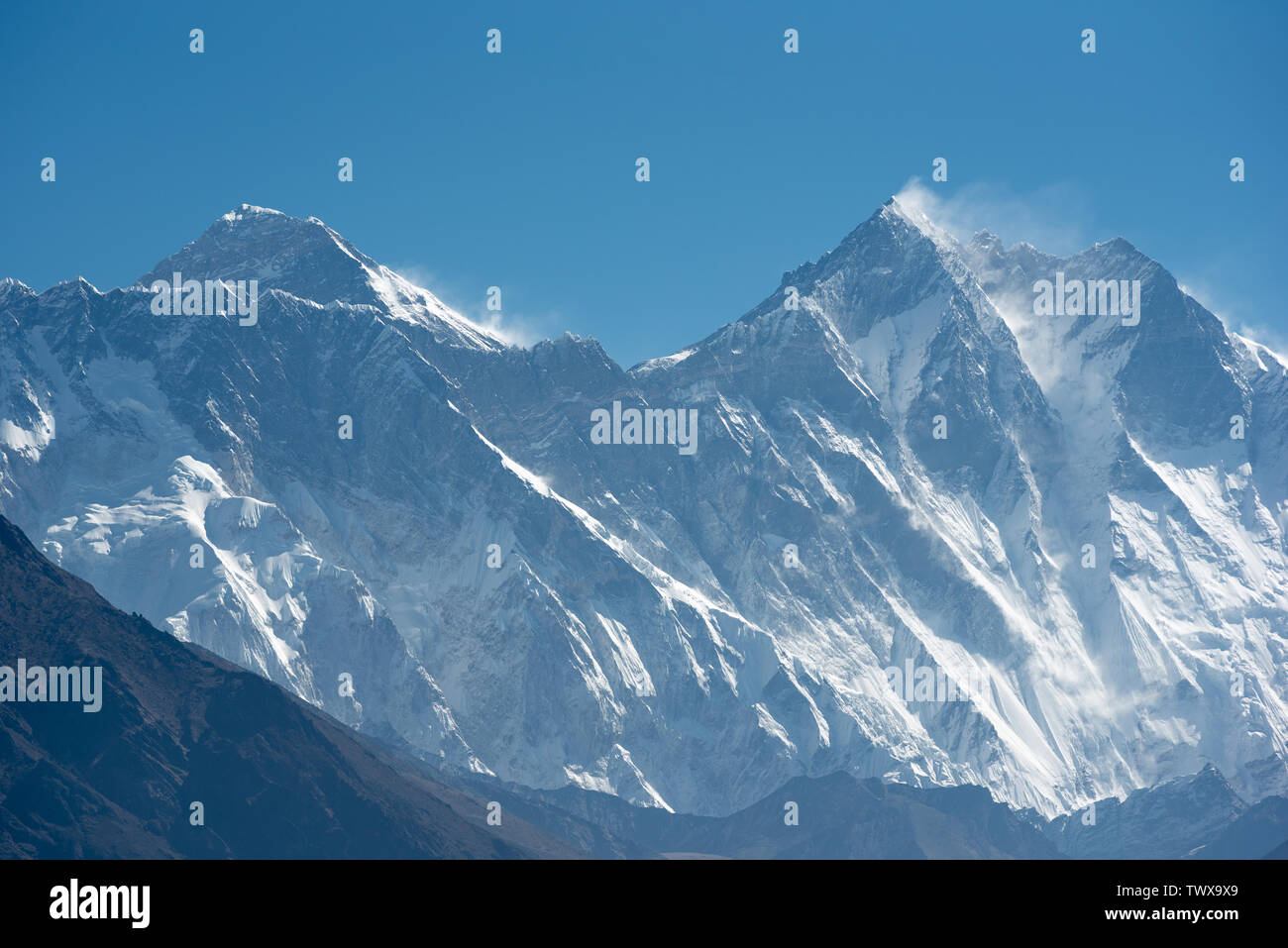 Worlds highers mountain Everest and nearby Lhotse on clear day in Nepal Himalayas Stock Photo