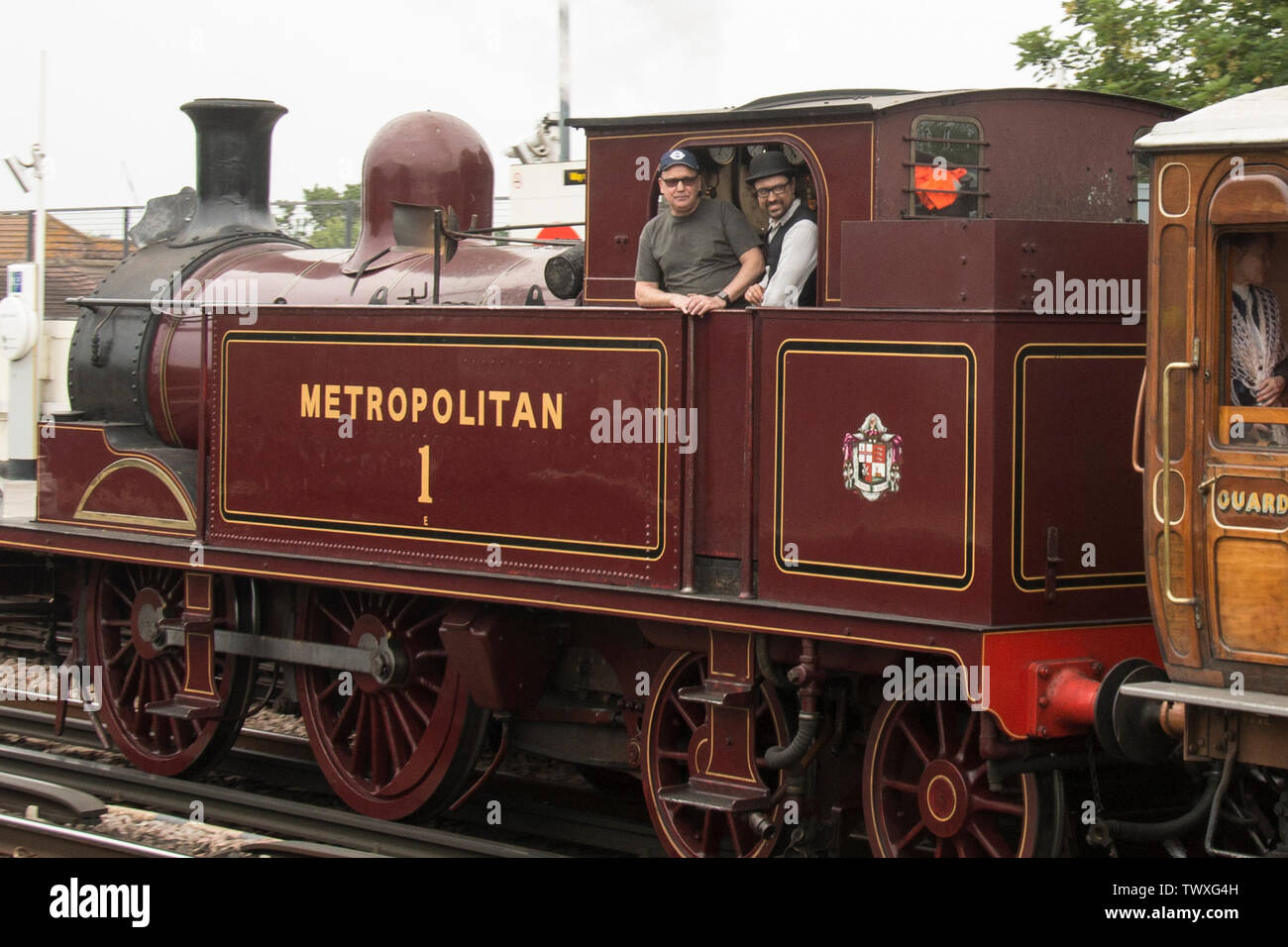 23 June 2019 - London - Metropolitan steam locomotive no 1 hauling a heritage steam train between High Street Kensington and Ealing Broadway at Stamford Brook Station on 150th Anniversary of the District Line. Locomotive No 1 was built in 1898 at Neasden, 0-4-4T and is preserved at Buckinghamshire Railway Centre. Stock Photo