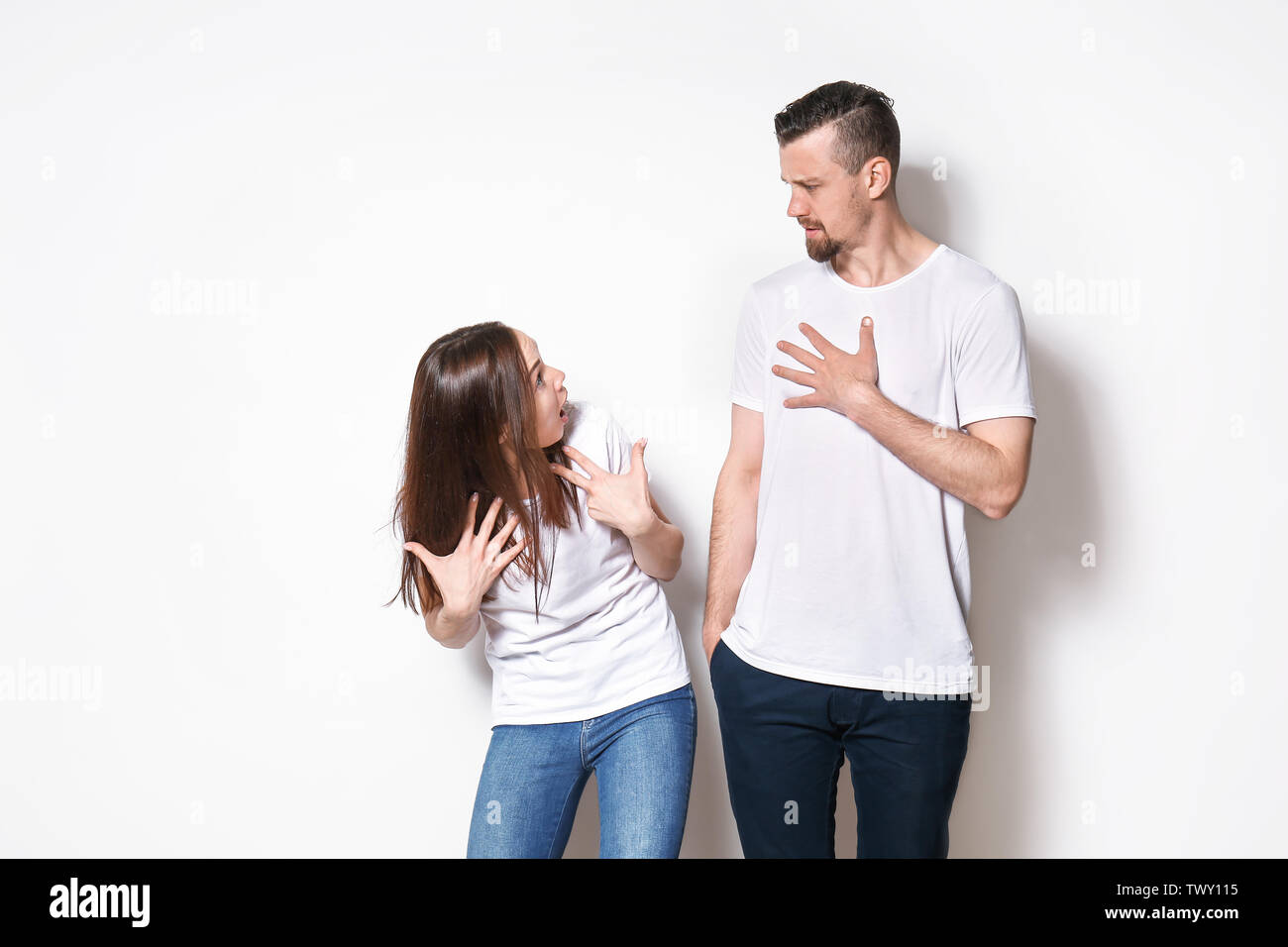 Confused young couple in hi-res stock photography and images - Alamy