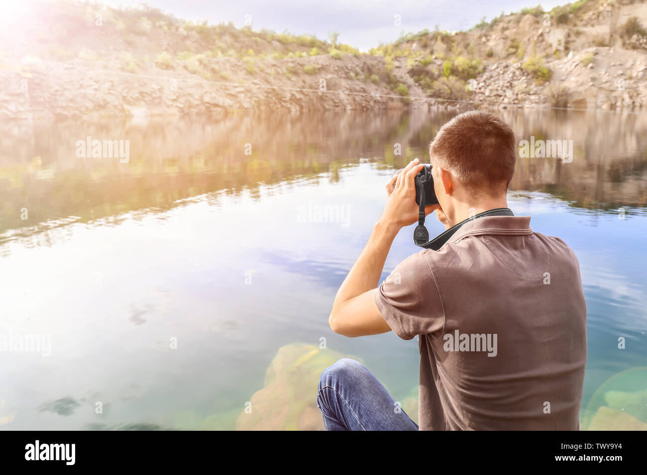 Male tourist taking photo hi-res stock photography and images - Alamy