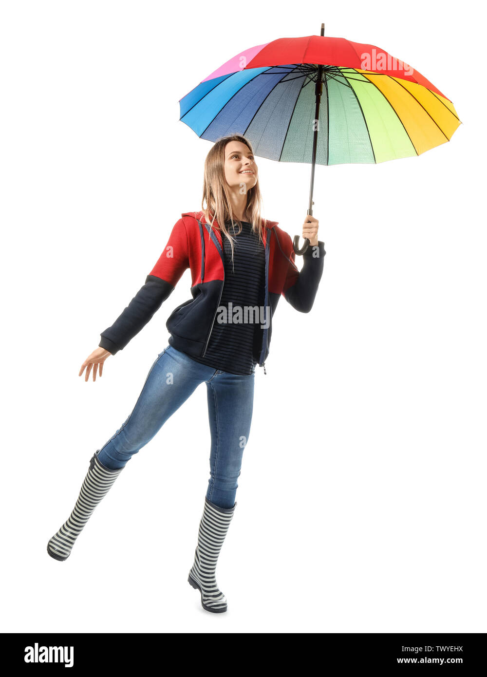 Beautiful young woman with umbrella on white background Stock Photo - Alamy