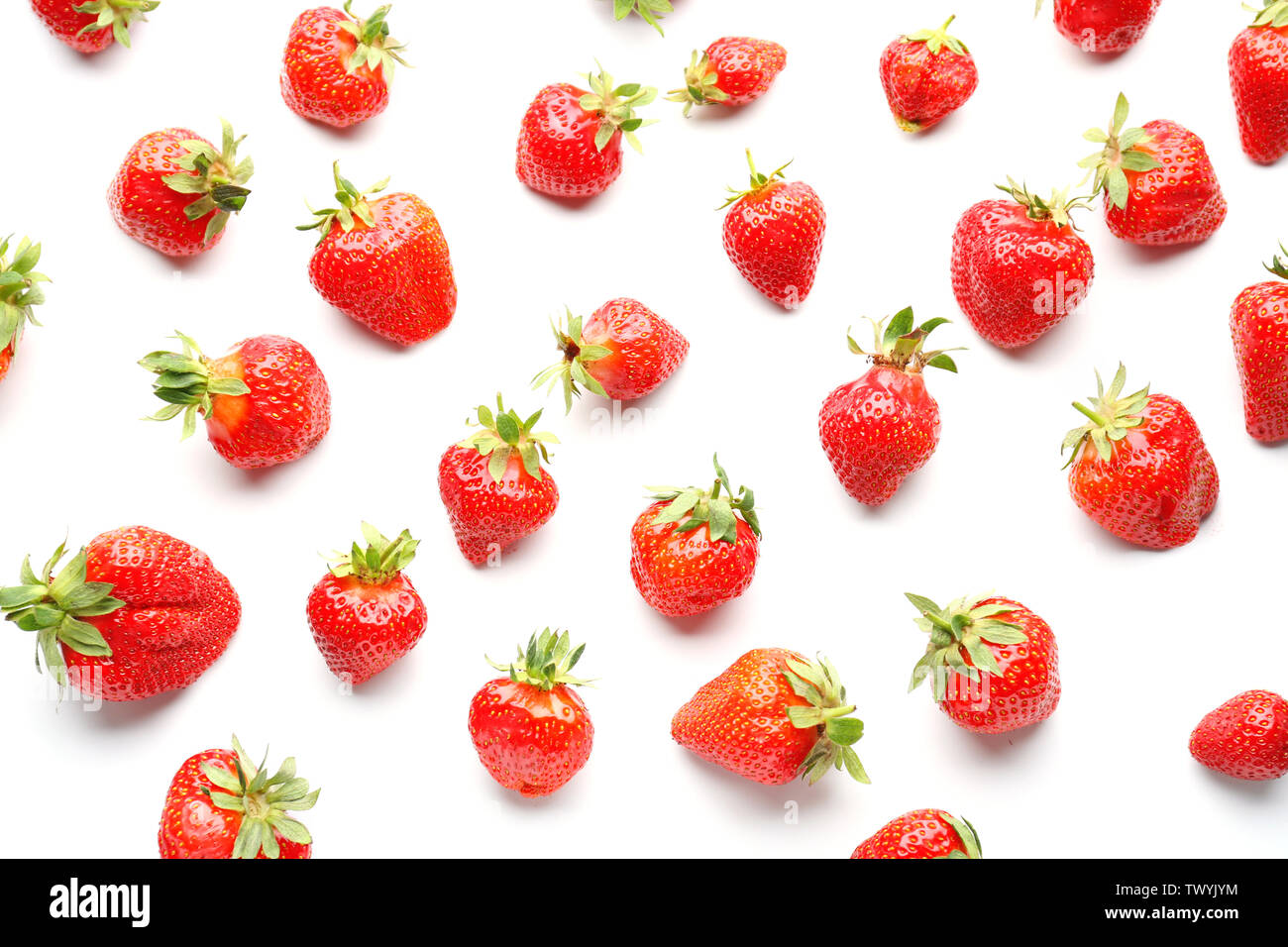 Ripe red strawberry on white background Stock Photo - Alamy