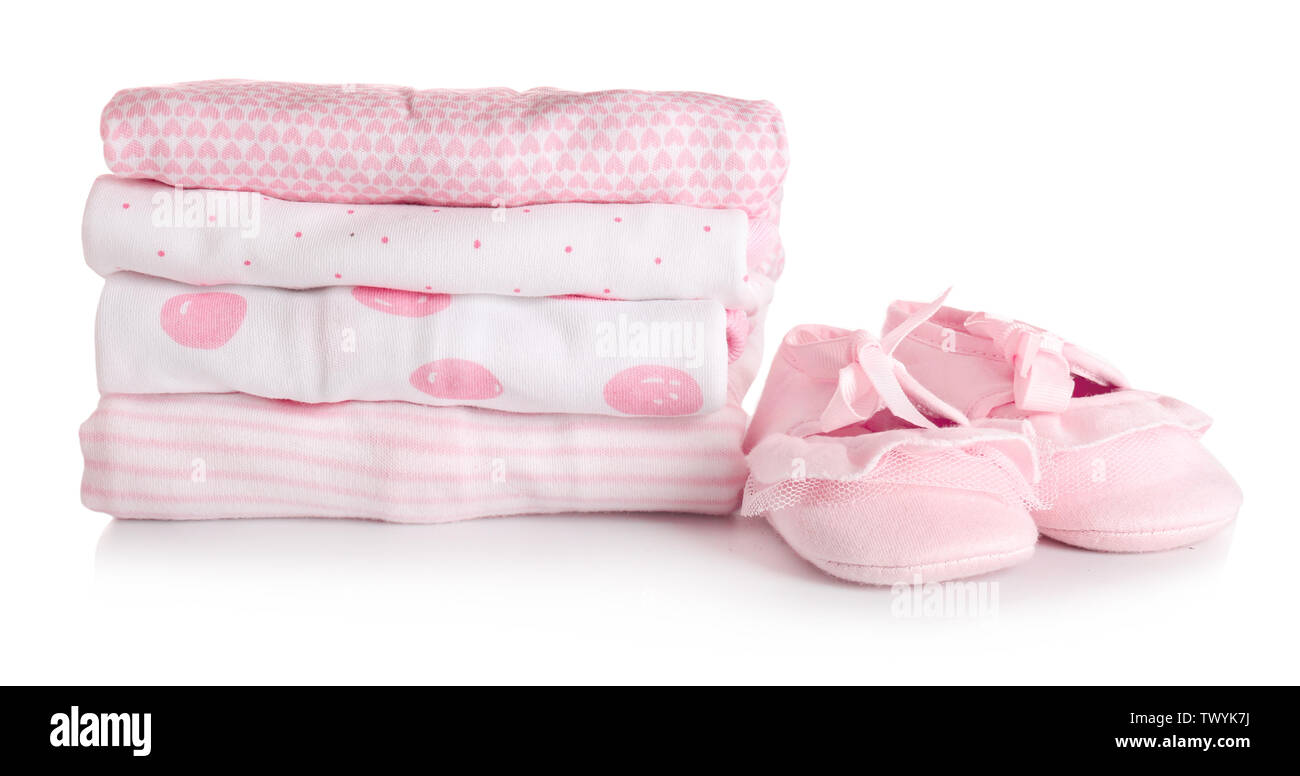 Stack of baby clothes and shoes on white background Stock Photo Alamy
